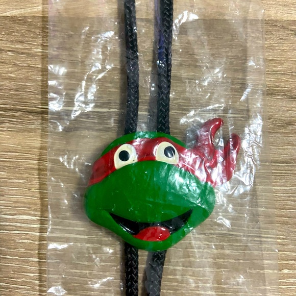 Vintage 1989 TMNT Ninja Turtles Raphael Kids Bolo Tie - Picture 1 of 5